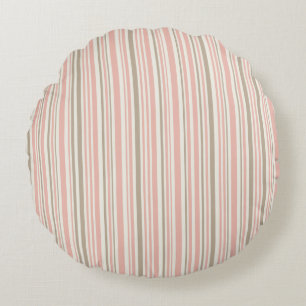 Geometric pattern of pink and brown lines round cushion