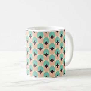 Geometric pattern of teal, beige, and black shapes coffee mug