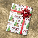 German Shepherd, Bird, and Christmas Tree Wrapping Paper<br><div class="desc">The repeated pattern on this cute Christmas wrapping paper is an image of a German Shepherd Dog wearing a red Christmas scarf. The dog sits among brightly wrapped gift packages beside a decorated Christmas tree. A bullfinch bird is landing on the tree, and the dog is watching it. Stylised red...</div>