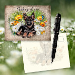German Shepherd Dog in Wildflowers Custom Postcard<br><div class="desc">Thinking of you, German Shepherd dog postcard. White daisies, yellow calendula, palmetto palm fronds and a blue butterfly surround a sweet pup lying in a bed of flowers. Background image is dark linen fabric (design only) with black script along the top that is easy to change to your choice of...</div>