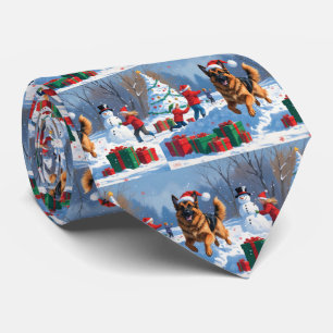 German Shepherd Running in Snow with Christmas Hat Tie