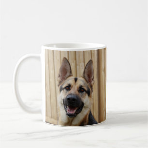 German Shepherd Sitting by Wood Fence Coffee Mug