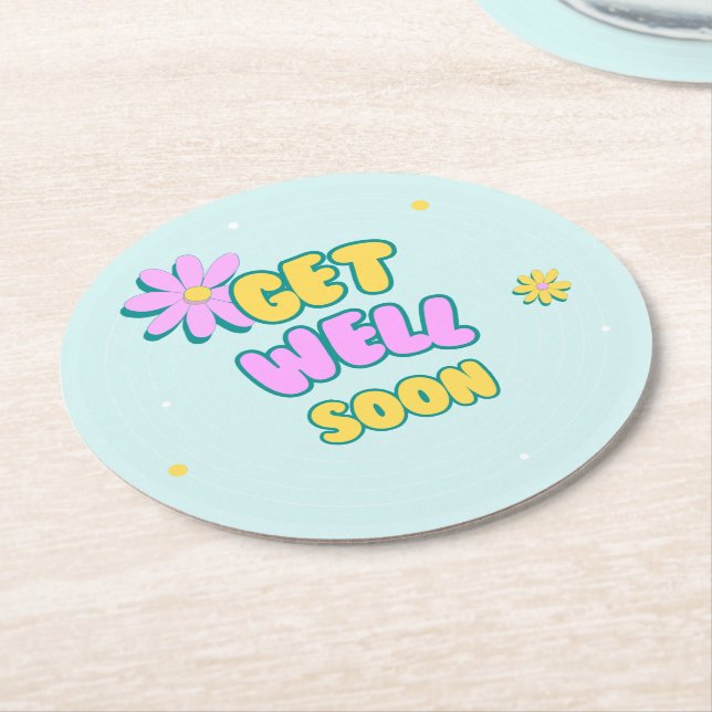 Get well soon bold text with flowers on blue round paper coaster (Angled)