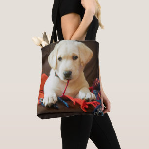 Getty Images   Puppy On A Sofa Tote Bag