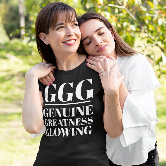 GGG- Genuine, Greatness, Glowing T-Shirt (A daughter holds her mother. The mother wears a "GGG: Genuine, Greatness Glowing" black t-shirt.)