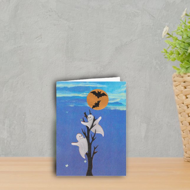 Ghosts in a Tree Halloween Card (Two cute ghosts in tree orange moon with bats blue night sky stars on Halloween notecard.)