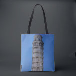 Gift Bag<br><div class="desc">This captivating photograph showcases the iconic Leaning Tower of Pisa standing elegantly against a deep blue twilight sky in Pisa. The historic marble tower, famous for its unmistakable tilt, is beautifully illuminated, highlighting its intricate Romanesque arches and layered columns. The soft evening light creates a striking contrast between the glowing...</div>
