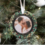 Gilded Greenery Black Married and Merry Two Photo Ornament<br><div class="desc">This gorgeous newlyweds holiday keepsake ornament feature a lush, festive wreath of gold leaves, Christmas greenery, and red holly berries on a modern black background. Your personal wedding photo goes in the center along with the words "Married and Merry", and there is even a spot for your name. A second...</div>