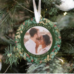 Gilded Greenery Green Married and Merry Two Photo Ornament<br><div class="desc">This gorgeous newlyweds holiday keepsake ornament feature a lush, festive wreath of gold leaves, Christmas greenery, and red holly berries on a modern forest green background. Your personal wedding photo goes in the centre along with the words "Married and Merry", and there is even a spot for your name. A...</div>