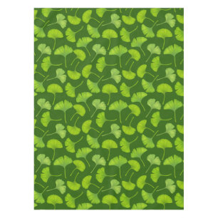 Ginkgo pattern on dark green tablecloth