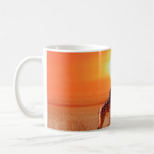 Giraffe in the African savanna against the backdro Coffee Mug