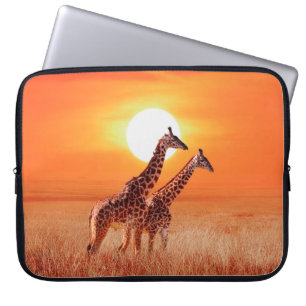 Giraffe in the African savanna against the backdro Laptop Sleeve