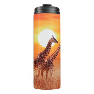 Giraffe in the African savanna against the backdro Thermal Tumbler