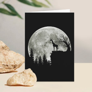 giraffe standing on moon halloween card