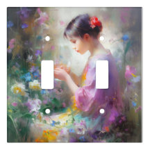 Girl admiring a flower in her hands