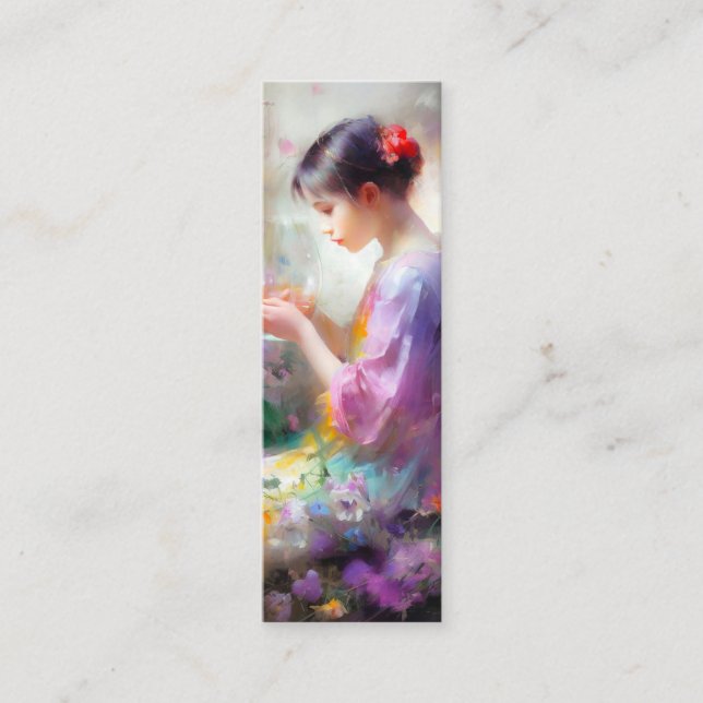 Girl admiring a flower in her hands  mini business card (Front)