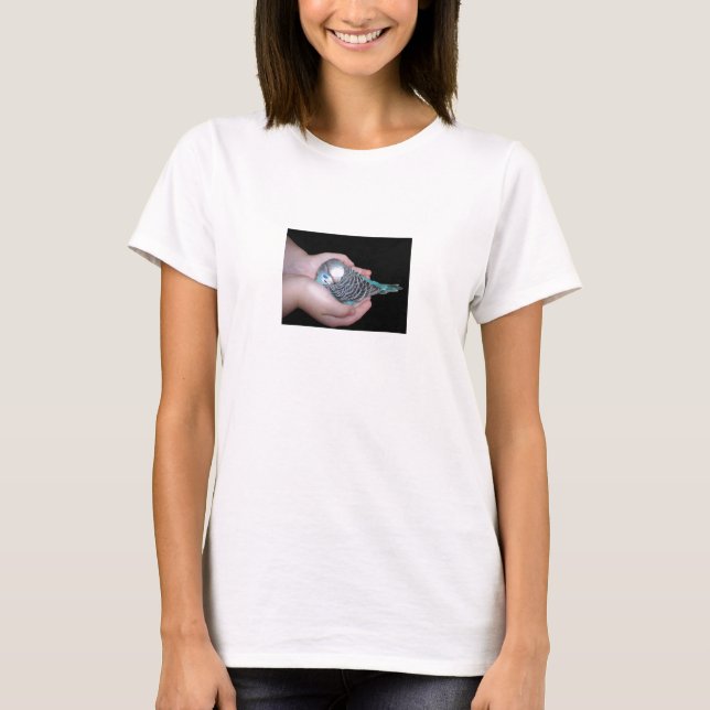 Girl holding baby budgie baby doll shirt (Front)