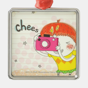 Girl holding camera, clicking metal tree decoration