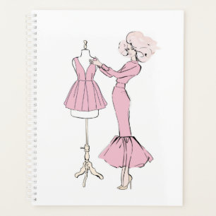 Girl in pink dress with dress on manikin planner