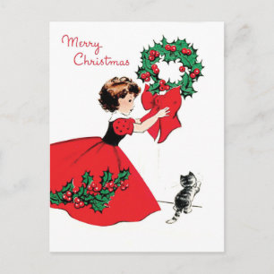 Girl in red dress with Christmas wreath and a cat Postcard