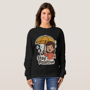 Girl in the rain… but with a smile sweatshirt