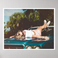 Girl lying on vintage 50s car photo