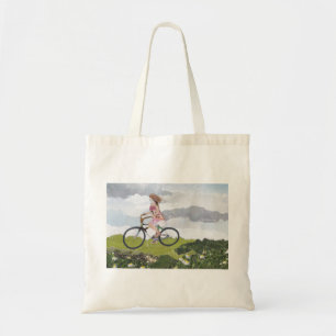 Girl on bicycle tote bag