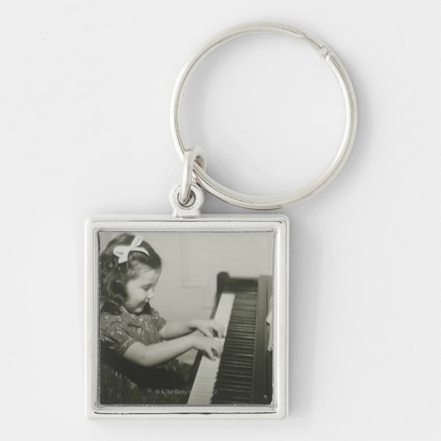 Girl Playing Piano Key Ring (Front)