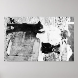 Girl Playing with Bear Cub in Seward Poster