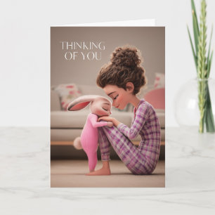 Girl Sitting with Bunny in Pajamas Thinking of You Card
