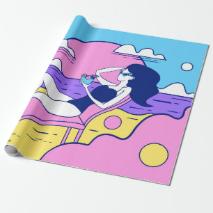 girl sunbathes on the beach with a cocktail in han wrapping paper