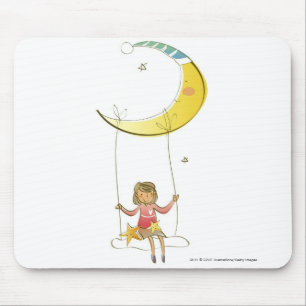 Girl swinging on a rope hanging from crescent moon mouse pad