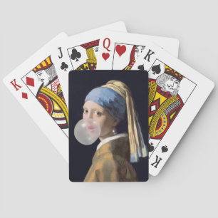Girl with pearl earring blowing a bubble gum playing cards