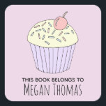 Girl's Cute This Book Belongs Cupcake Muffin Name Square Sticker<br><div class="desc">This cute whimsical girly design is a part of a collection featuring cute doodle for children and baby's apparel, accessories, and nursery decor. This bookplate design features the words 'this book belongs to' and a hand drawn doodle pastel cupcake muffin and can be personalised with your child's name. A perfect...</div>