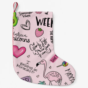 Girls fun concept with unicorn, flamingo, cactus, small christmas stocking