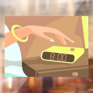 Girls hand pushing on alarm clock snooze button