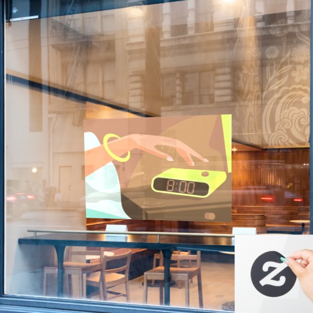 Girls hand pushing on alarm clock snooze button (Cafe Window)