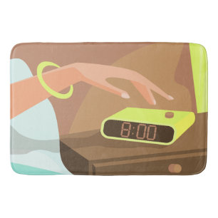 Girls hand pushing on alarm clock snooze button bath mat