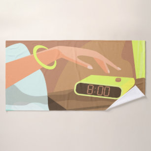 Girls hand pushing on alarm clock snooze button bath towel