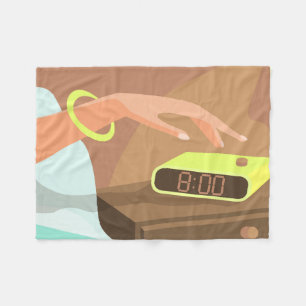 Girls hand pushing on alarm clock snooze button fleece blanket