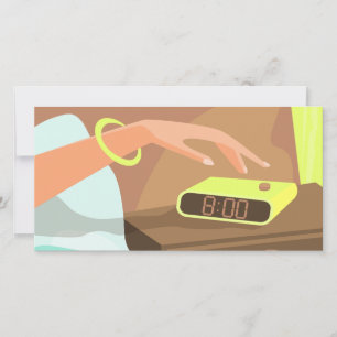 Girls hand pushing on alarm clock snooze button holiday card