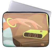 Girls hand pushing on alarm clock snooze button