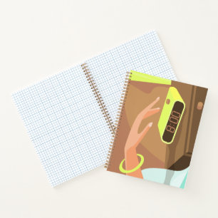 Girls hand pushing on alarm clock snooze button notebook