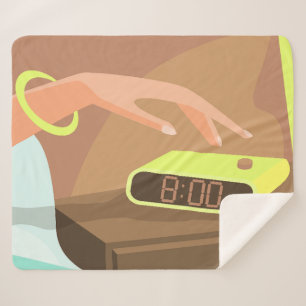 Girls hand pushing on alarm clock snooze button sherpa blanket
