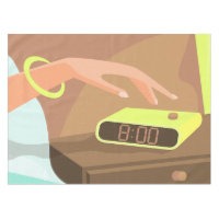 Girls hand pushing on alarm clock snooze button