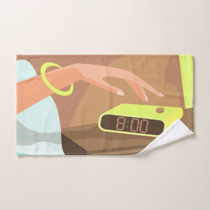 Girls hand pushing on alarm clock snooze button towel