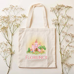 Girls Whimsical Pink Princess Castle Kids Tote Bag<br><div class="desc">This cute and whimsical girls tote bag features a pink enchanted castle,  with a prince and princess,  and space to add a name in elegant typography. The perfect girly magical design for any kid or fantasy-loving adult!</div>