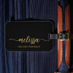 Girly Black Gold Monogram Name Signature Script Luggage Tag<br><div class="desc">Girly Feminine Minimalist Simple Clean Black and Gold Monogram Name Signature Script Custom Personalised Luggage Bag Tag. This design featuring your first name in a pretty hand lettered style swash tail calligraphy font signature (or typography) and full name in gold on black background. These are easy to customise it. Stylish...</div>