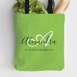 Girly Bright Green Trendy Elegant Script Monogram Tote Bag<br><div class="desc">Personalise your beautiful monogrammed, trendy bright green Grocery Tote Bag! The text below may be personalised to your preferred sentence or even your full name; you can also delete it if you prefer. If you need help, please let us know at belytaliarecipes@gmail.com, and we will gladly assist you. © Belytalia...</div>
