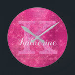 Girly Hot Pink Glitter Sparkle Glam Monogram Name Round Clock<br><div class="desc">This trendy and unique glam girly design features a large customisable monogram in pale pink in the centre in popular serif typography along with a customisable name in popular script with a hand-lettered look in pinkish white. The background includes brushed hot pink fuchsia magenta metal and glimmering diamonds for added...</div>